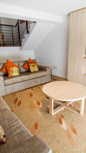 colorful living room in 2 bedroom apartment