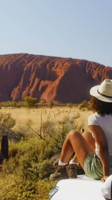 Woman looking at ayer's rock